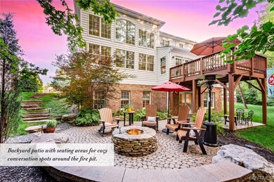Backyard patio with seating areas for cozy convers