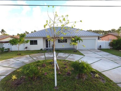 CONCRETE DRIVEWAY AND HALF CIRCLE HAS 6X6X8 WIRE O