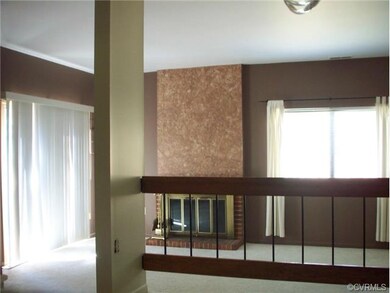 Living room with view to private wooded rear