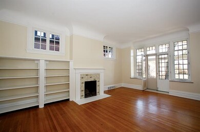 Living Room with decorative fireplace and walk-out