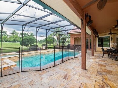 Pool/spa, covered lanai with travertine deck and v