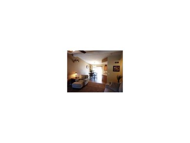 Tiled dinette area beside kitchen
