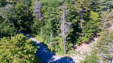 Aerial of corner lot near lake