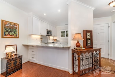 BREAKFAST BAR  HAS ADDITONAL STORAGE AND MAKES A GREAT SERVING STATION