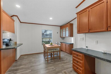 Kitchen featuring light hardwood / wood-style floo