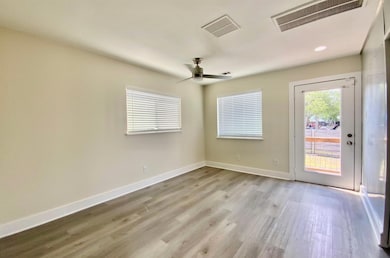 Unfurnished room featuring light wood-style floor