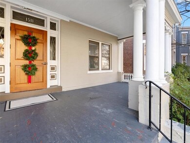 Beautiful front porch invites you to relax and enj