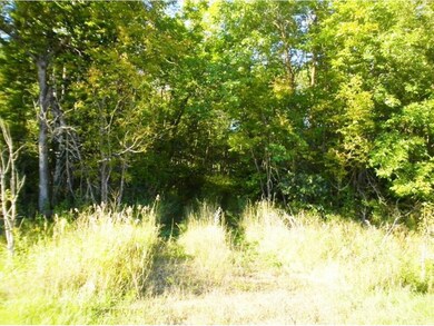 West end of U shaped driveway onto property.