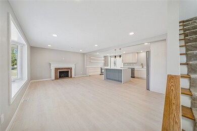A wide-open, modern, clean floor plan greets you a