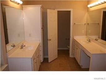 Double vanities, a separate shower and a jetted ga