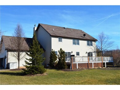 Back of home, 2 sliders (from kitchen and dining),