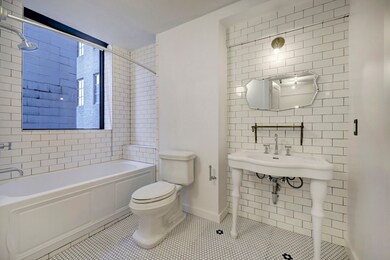 The en suite bathroom for the second bedroom has a