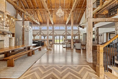 Lobby featuring high vaulted ceiling, beamed ceil