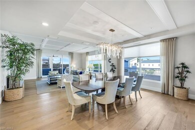 Floor to ceiling windows, rich wood plank flooring, custom lighting and so much more!