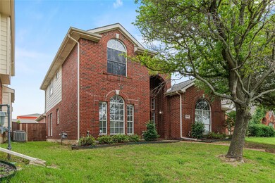 View of front of property with a front lawn and ce