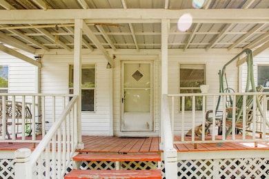 Entrance to property with a porch