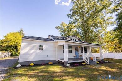 Bungalow-style house with covered porch and crawl space