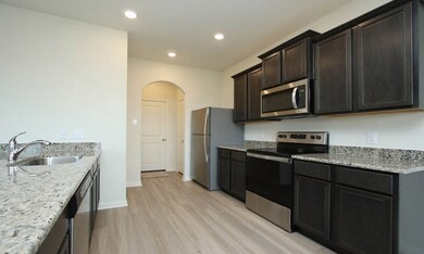 Polished granite counters make a beautiful workspace for making and serving meals.