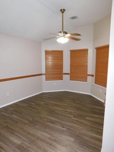 Unfurnished room featuring lofted ceiling, ceilin