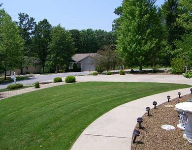 Exterior Front. Beautiful landscaping all around the house