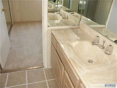 Separate vanity and sink outside bathroom