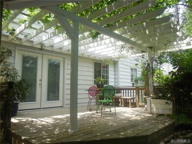 The large Deck with Pergola is a lovely setting fo