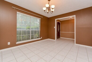 Oversized formal dining room perfect for holiday g