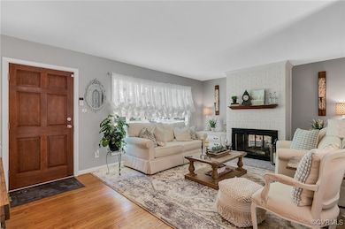 Living area with light wood-style floors and a bri