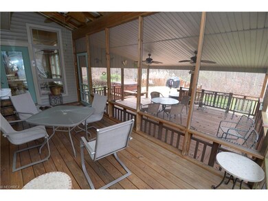 screened portion of deck & entry to house (dining 