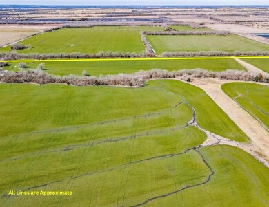 Birds eye view of property with a rural view