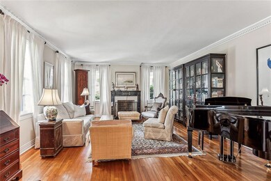 Formal Living Room overlooks St Charles Ave with p