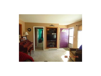 Built-in entertainment center will hold nice-size 