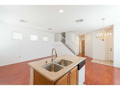 Property Photo. Kitchen Open to Living Room