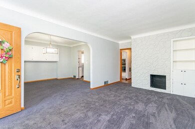 Freshly painted large first floor living room.  New carpet in both living rooms and dining room to the bedrooms.