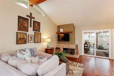 Living Room w/Marble-Tiled Fireplace