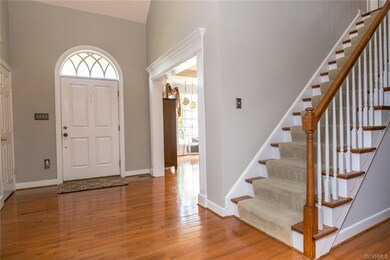 Gleaming hardwood floors are found throughout the 