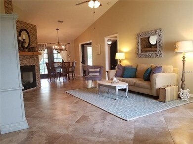 Great Room,  notice the large tile flooring, vault
