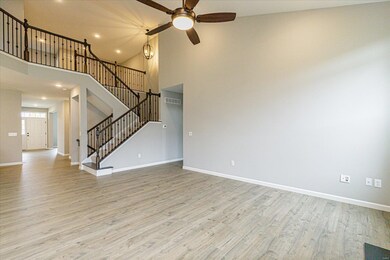 Beautiful Staircase with Wrought Iron Spindles