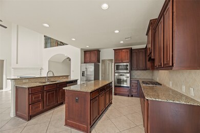 Beautiful island kitchen with granite countertops,