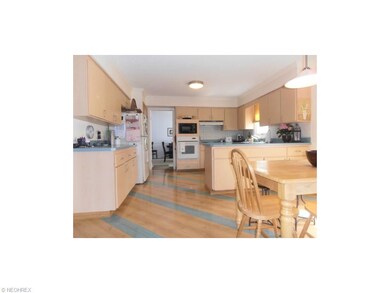 Kitchen opens to Dining Room and also the Family R