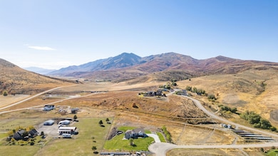 View of property location with a mountainous background and rural landscape