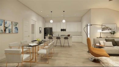 Dining room featuring light wood-style flooring an