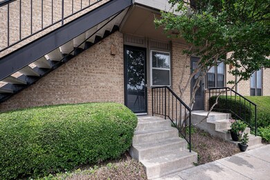 BACK ENTRANCE TO DOWNSTAIRS CONDO. STEPS AWAY FROM