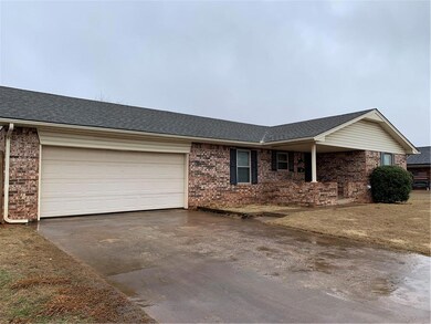 Two car garage with garage door lift.  Can park 4 