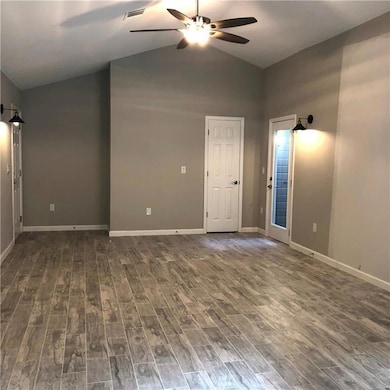 Unfurnished room with ceiling fan, wood finished 