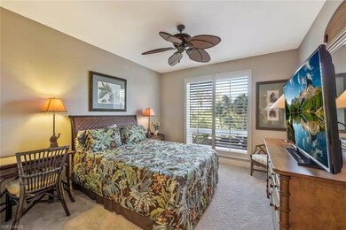 Bedroom featuring carpet flooring, baseboards, and