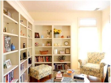 Beautiful library with great lighting.  Built-ins 