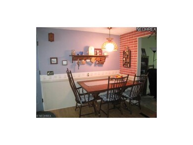 Dinette with laminate floors.