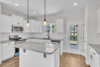 Has spacious breakfast bar and Island