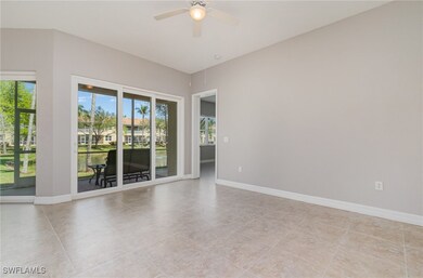 Empty room featuring baseboards and ceiling fan